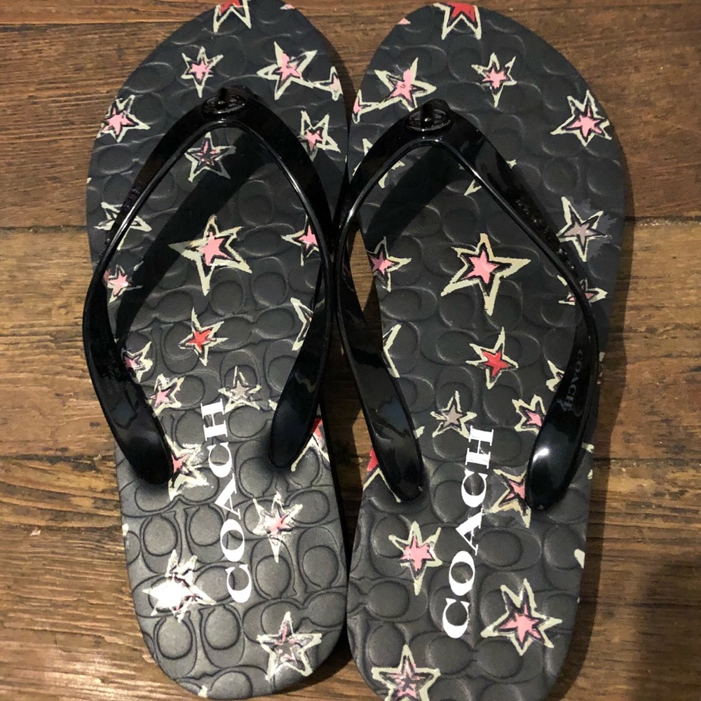 Coach black with stars flip flops